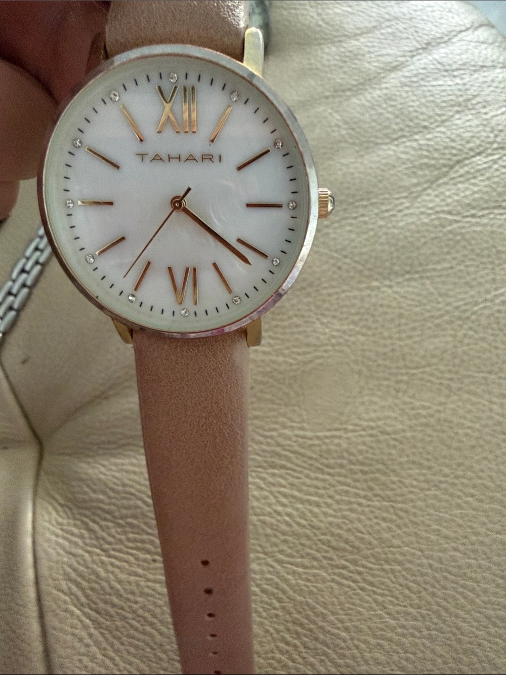 Tahari Blush Leather Strap Watch with Rose Gold Accents needs battery